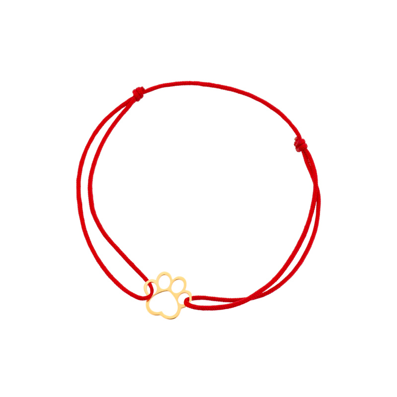 Bransoletka pozłacana psia łapka czerwony sznurek Bransoletka pozłacana psia łapka czerwony sznurek
