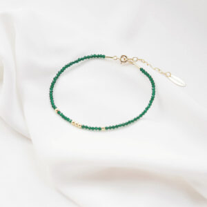 Bransoletka pozłacana z zielonymi cyrkoniami