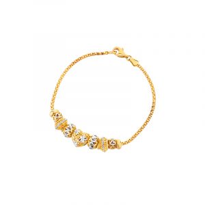 Bransoletka z białym złotem z ażurowymi elementami